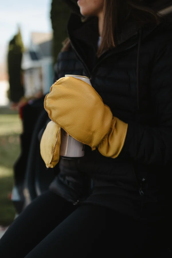 DEER GRAIN MITT HOLDING CUP UP CLOSE