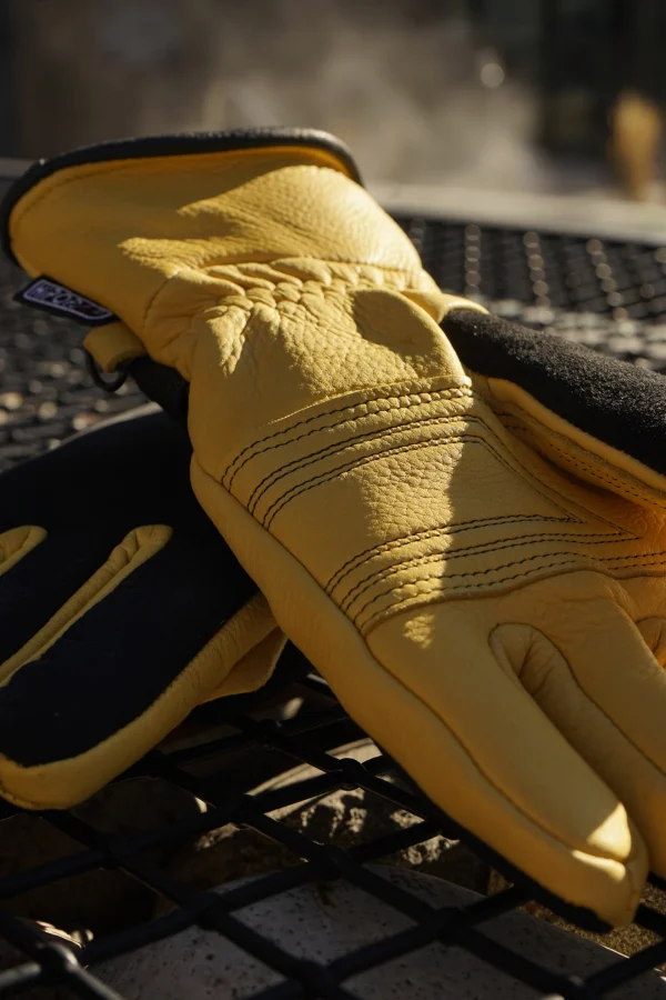 Snowpack leather ski glove on top of each other