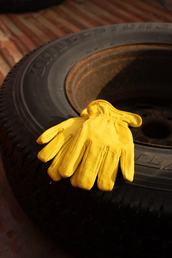 Campers glove on tire