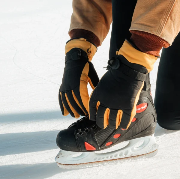 Snowpack glove tying shoes